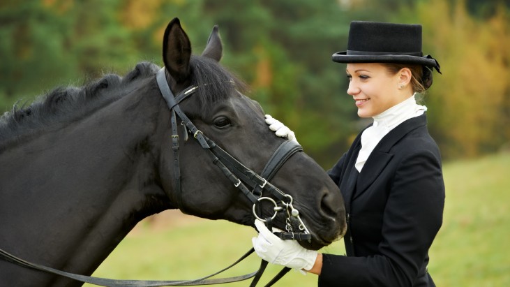 Horsewoman Jockey In Uniform With Horse